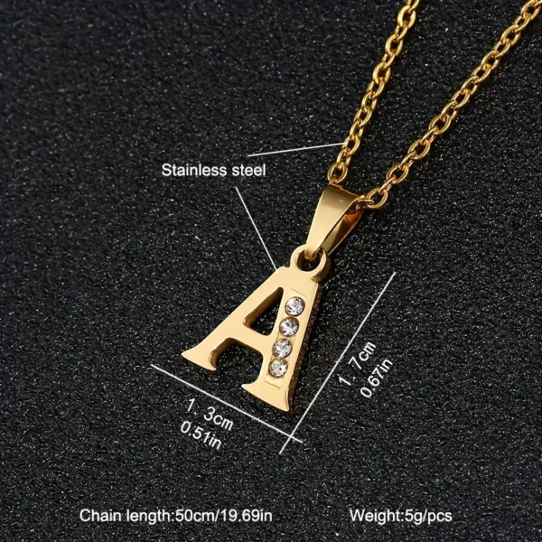 The Stainless Steel Letter Necklace showcases a gold chain and a sparkling "A" pendant embellished with four rhinestones. The pendant dimensions are 1.3 cm in width by 1.7 cm in height, the chain is 50 cm (19.69 inches) long, and the whole piece weighs merely 5 grams.