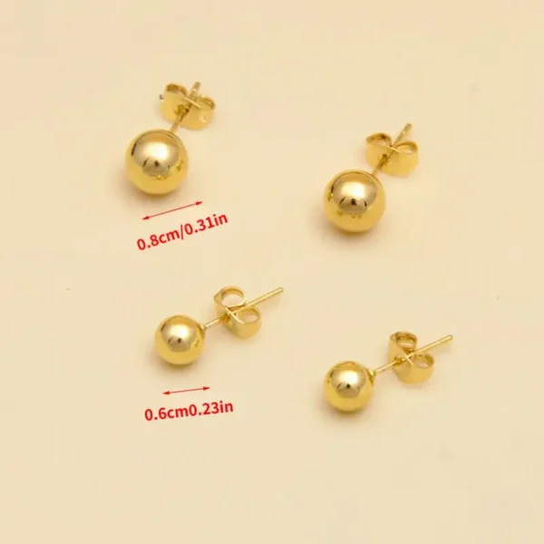 Four Stylish 14K Gold Plated Ball Stud Earrings - Perfect Gift for Women and Girls are displayed on a neutral background. There are two pairs, one with a ball size of 0.8 cm (0.31 in) and the other with a ball size of 0.6 cm (0.23 in). Each ball stud earring features a simple post and butterfly back for easy wear.