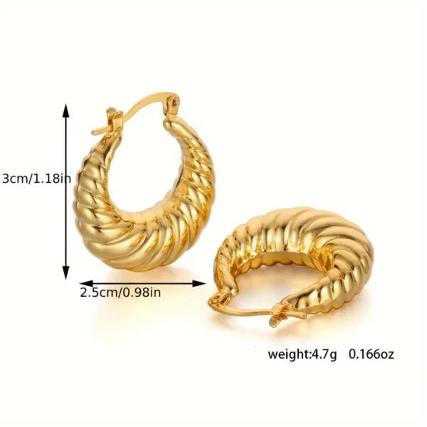 Two elegant Delicate Golden Horn Bag Hoop Earrings – Vintage Copper Jewelry for Daily Casual Elegance with a twisted design are shown. These gold hoop earrings measure 3 cm (1.18 in) in height and 2.5 cm (0.98 in) in width, each weighing 4.7 g (0.166 oz). The vintage-inspired earrings have latch back closures.