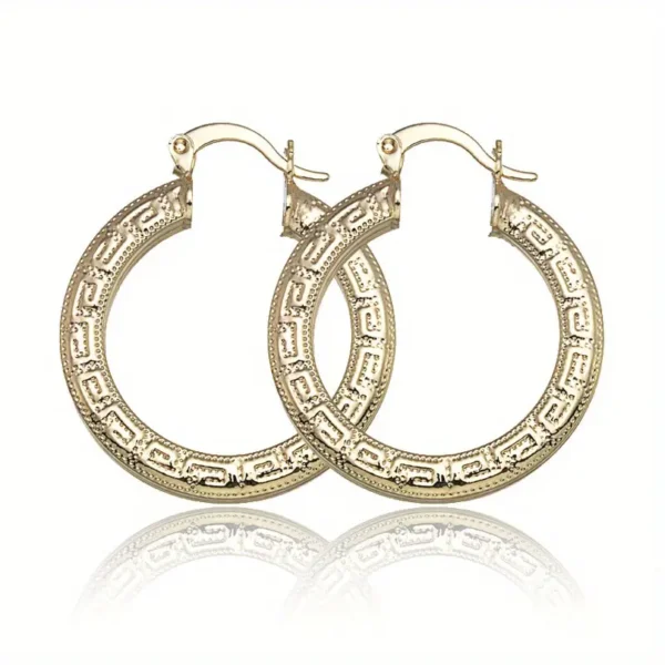 A pair of Elegant 14K Gold Plated Hoop Earrings with intricate Great Wall print. The vintage style hoops feature a circular design with a hinge clasp closure at the top, and they are placed side by side with a slight overlap, casting a faint reflection on a white surface.