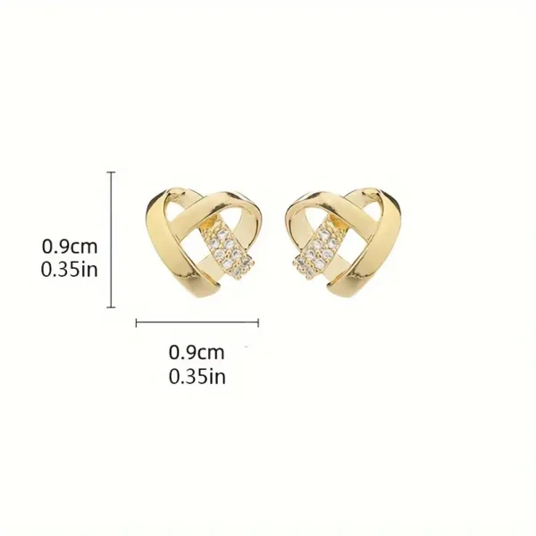 a pair of gold earrings with diamonds